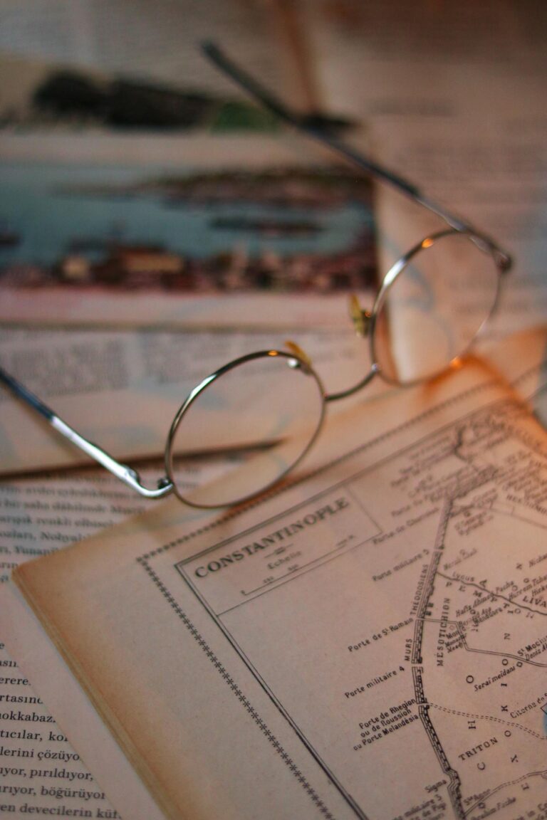 Close-up of a vintage map of Constantinople with eyeglasses, evoking exploration.